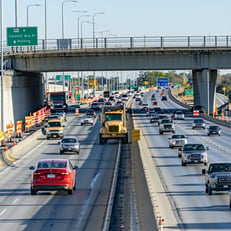 construction during rush hour on Freeway I35 over pass with traffic